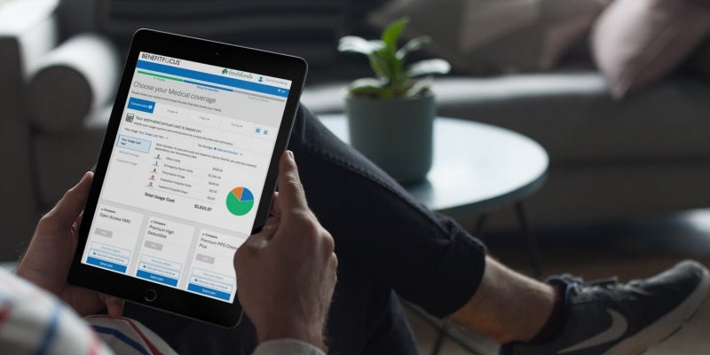 Person using tablet to review data