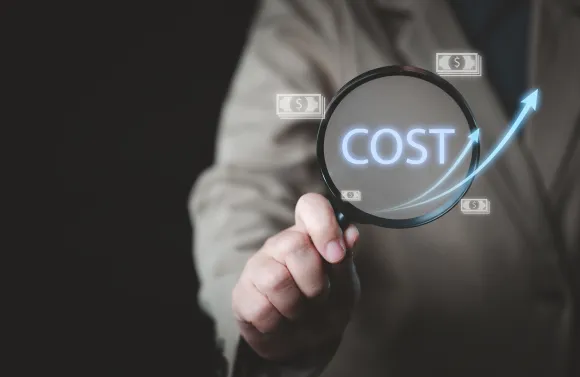 person holding a magnifying glass featuring the word Cost, with arrows