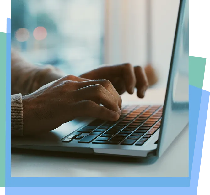 person typing on laptop